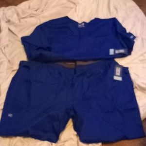 Navy blue NWT Cherokee scrubs top and bottom set. Size 3xl